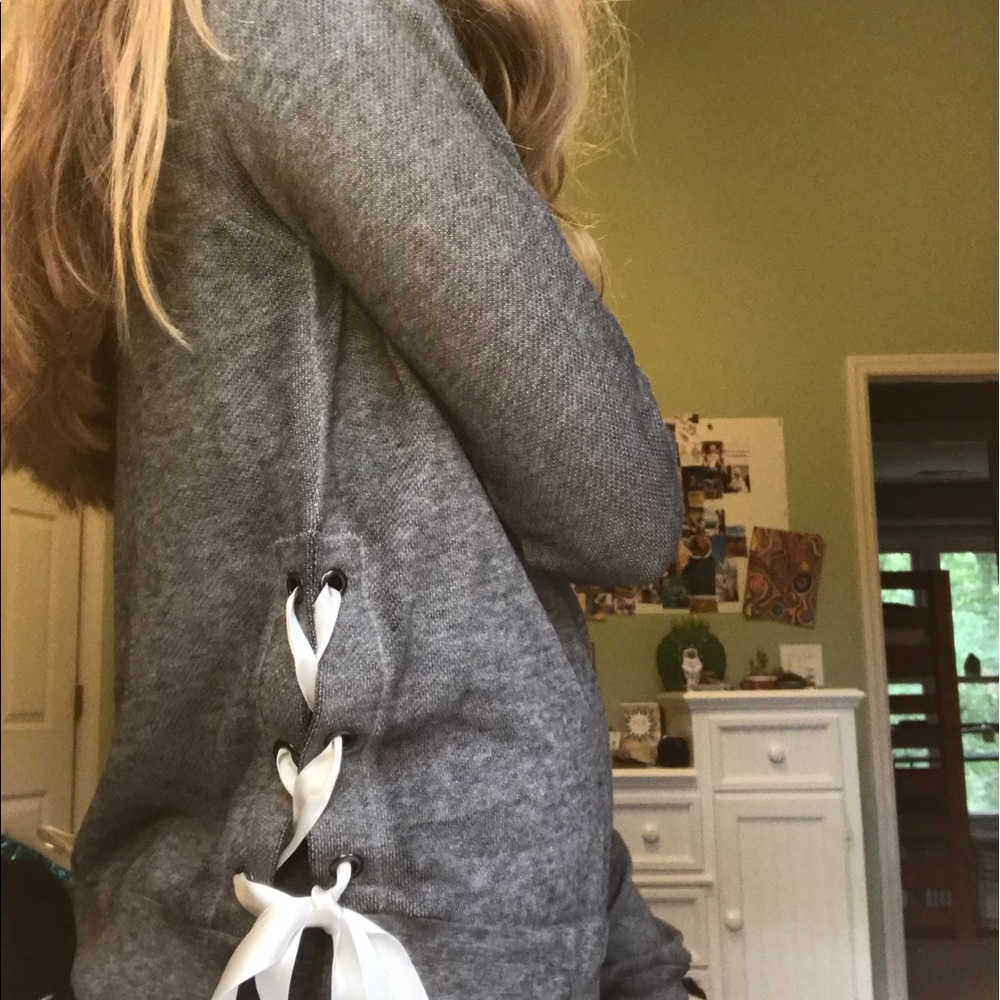 Gray sweater with white ties
